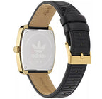 Rear view of Adidas AOSY24528 watch showing the engraved case back and ribbed black strap.