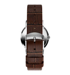 rear view showing the brown leather strap with buckle fastening of Timex Mens Watch Marlin Hand Wound TW2W93300 with brown leather strap and silver case