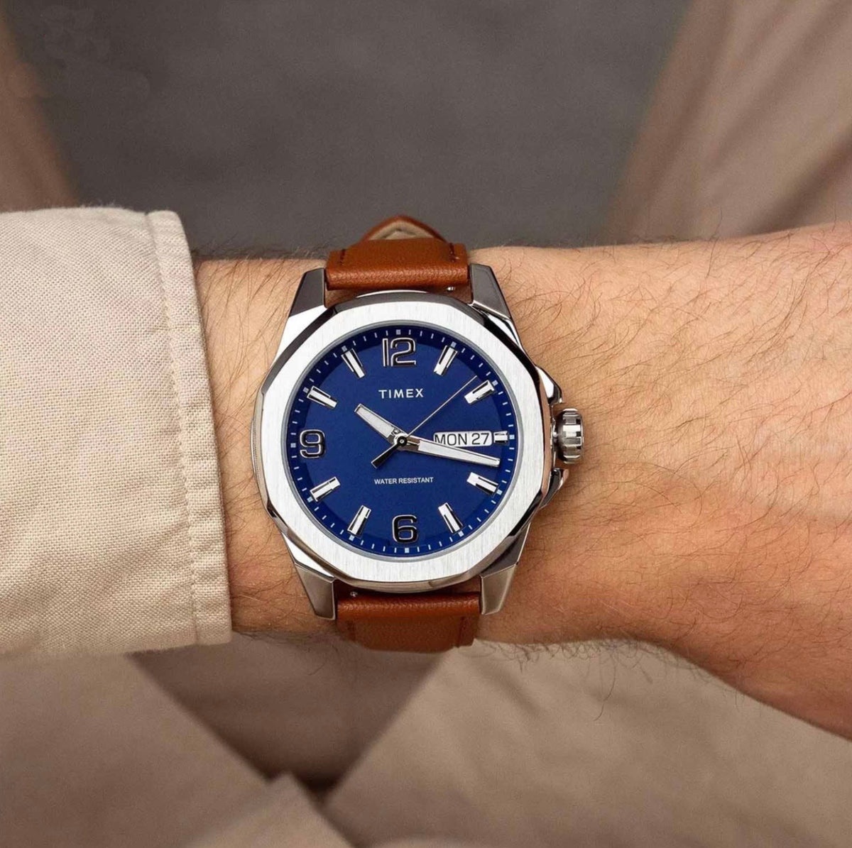 front view of Timex Mens Watch Essex Avenue TW2W92800, blue dial, silver case, brown leather strap worn by a man