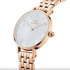 Daniel Wellington Petite Lumine 28mm ladies watch with a sleek silver case and white dial, featuring minimalistic design.