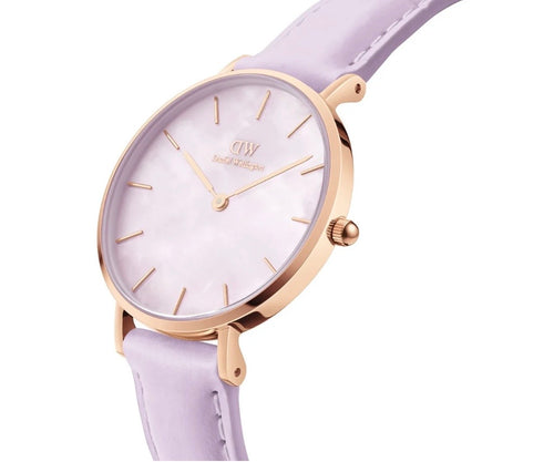 Daniel Wellington Ladies Petite Lavender Watch with 28mm case, silver dial, and purple leather strap on a white background.