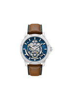 Kenneth Cole men's silver Harrison skeleton automatic watch displaying a detailed dial and stainless steel band.