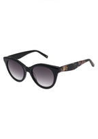 Ted Baker Women’s Maja Black Sunglasses with round frames and tinted lenses, featuring subtle brand detailing on the temples.
